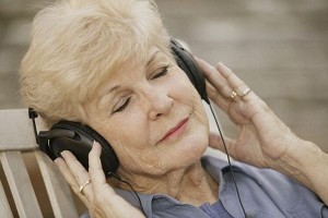 Senior Woman Listening to Headphones