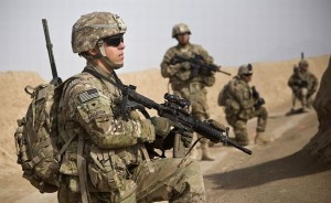 Soldiers from the U.S. Army go on patrol near Command Outpost AJK in Maiwand District, Kandahar Province