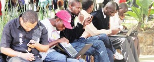 People-enjoying-free-internet-through-Wi-Fi-in-Africa-Unity-Square-1-1