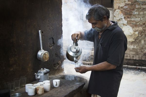 Tea Chai seller on the street, Varanasi Benares India