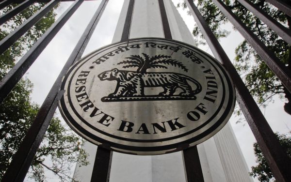 The Reserve Bank of India logo is pictured outside its head office in Mumbai