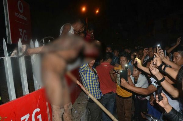 angry mob beat rape accused to death