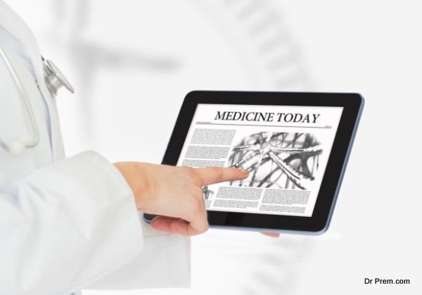 Doctor pointing on digital tablet