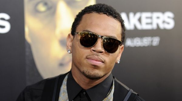 Actor and singer Chris Brown arrives at the premiere of "Takers" in Los Angeles, California August 4, 2010. REUTERS/Gus Ruelas (UNITED STATES - Tags: ENTERTAINMENT PROFILE)